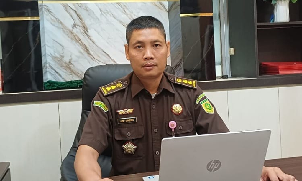 KETERANGAN - Kasi Pidsus Kejari Sidoarjo Sigit Sambodo memberikan keterangan soal perkara dugaan korupsi di Desa Mulyodadi, Kecamatan Wonoayu yang segera disidangkan pekan depan.