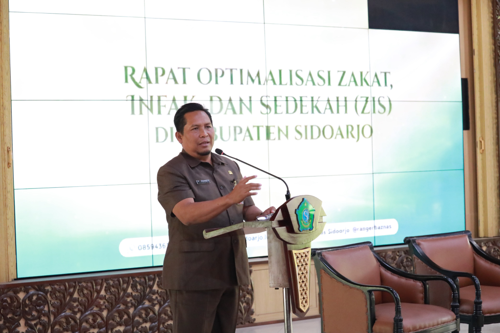 POTENSI - Pemkab Sidoarjo mendorong pembentukan Unit Pengumpul Zakat (UPZ) di 346 desa dan kelurahan untuk meraih target Rp 2,2 triliun per tahun saat Rapat Koordinasi Optimalisasi Pengumpulan ZIS Tahun 2026 di Pendopo Delta Wibawa, Rabu (09/09/2026).
