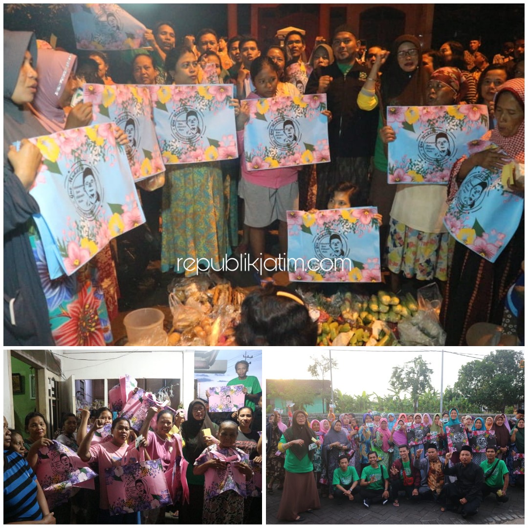 BAGIKAN - Salah satu koordinator Sido Resik, Laily Agustin membagikan kantong belanja ramah lingkungan kepada kalangan ibu-ibu (emak-emak) di sejumlah lokasi di Desa Tanjungsari dan Desa Krembangan, Kecamatan Taman, Sidoarjo, Sabtu (11/01/2020).