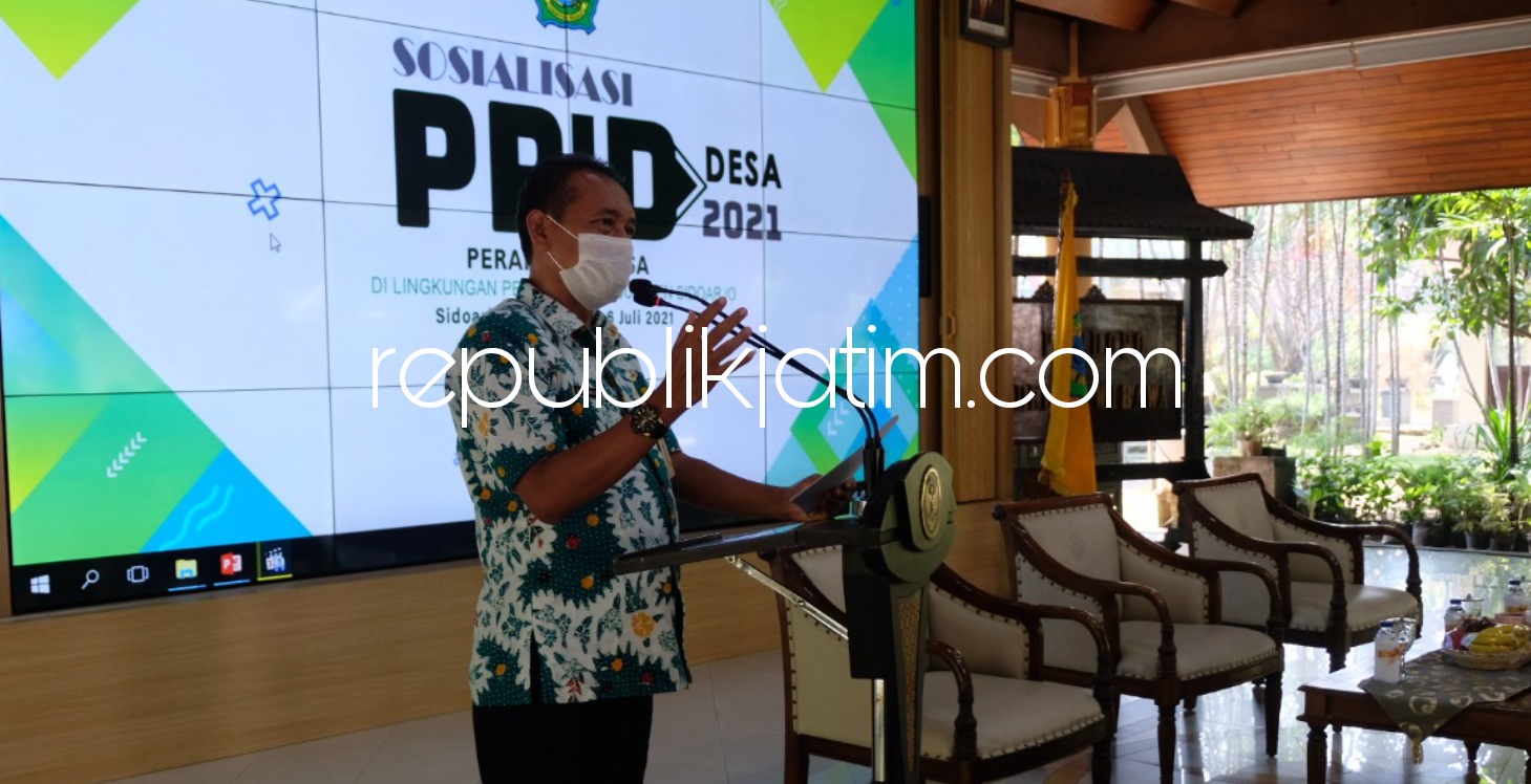 SOSIALISASI - Kabid Pengelolaan Informasi dan Komunikasi Publik, Dinas Kominfo Pemkab Sidoarjo, Kusdianto sosialisasi PPID Desa dalam mewujudkan UU Keterbukaan Informasi Publik hingga tingkat desa di Pendopo Delta Wibawa, Selasa (22/06/2021) kemarin.