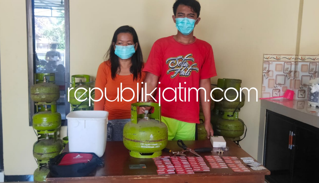 KOMPAK - Pasangan suami istri (pasutri) di Ponorogo ini kompak melakukan tindak pidana pembobol toko dan konter diringkus Polsek Siman, Sabtu (18/09/2021).