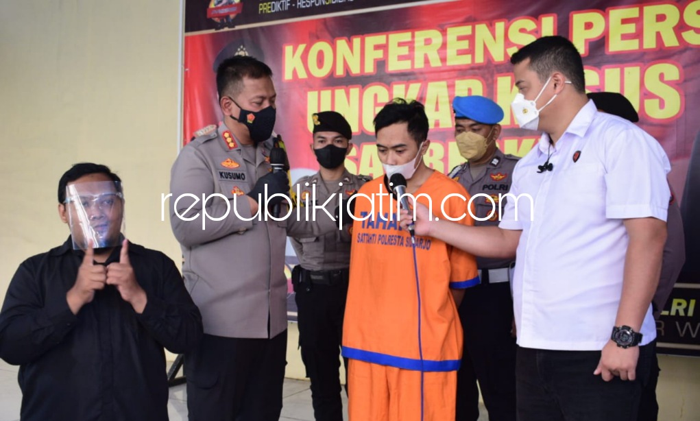 TERSANGKA - Tersangka TH (28) warga Waru, Sidoarjo yang dikenalnya melalui media sosial oleh korban AR (21) ditetapkan sebagai tersangka kasus sodomi terhadap korban, Senin (25/07/2022).