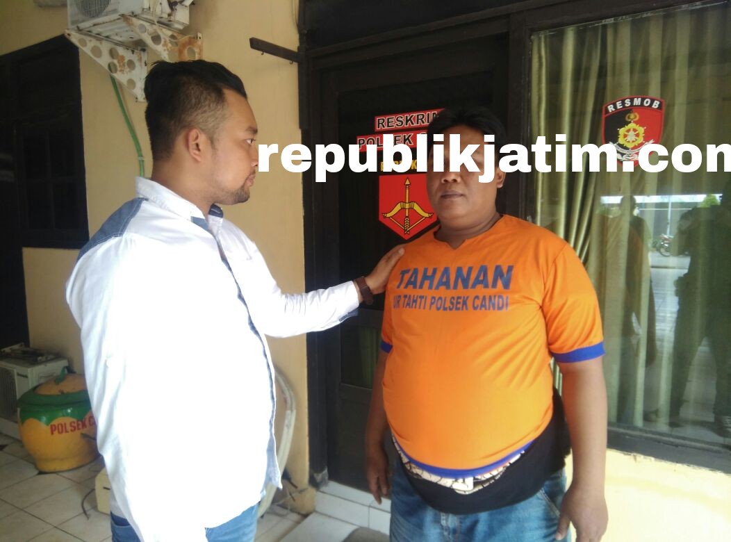 PERAMPAS - Tersangka perampasan Hand Phone (HP), Agus Suwandak Melani beserta barang buktinya di Polsek Candi, Minggu (21/01/2018).