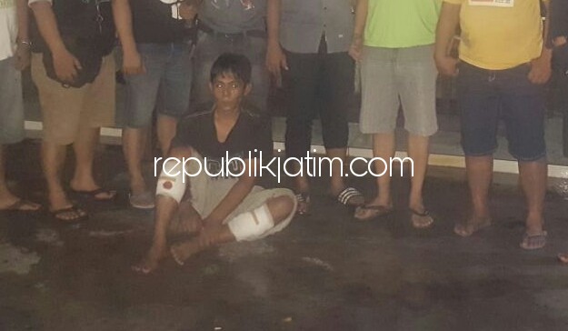 TERTANGKAP - Tersangka Tulam (44) warga Dusun Sidonganti, Desa Kraton, Kecamatan Kencong, Jember ditangkap Unit Pidum, Polresta Sidoarjo usai merampok pasutri Didik Murtadho (meninggal) dan Istining (luka) di Desa Pajarakan, Kecamatan Jabon pekan lalu.